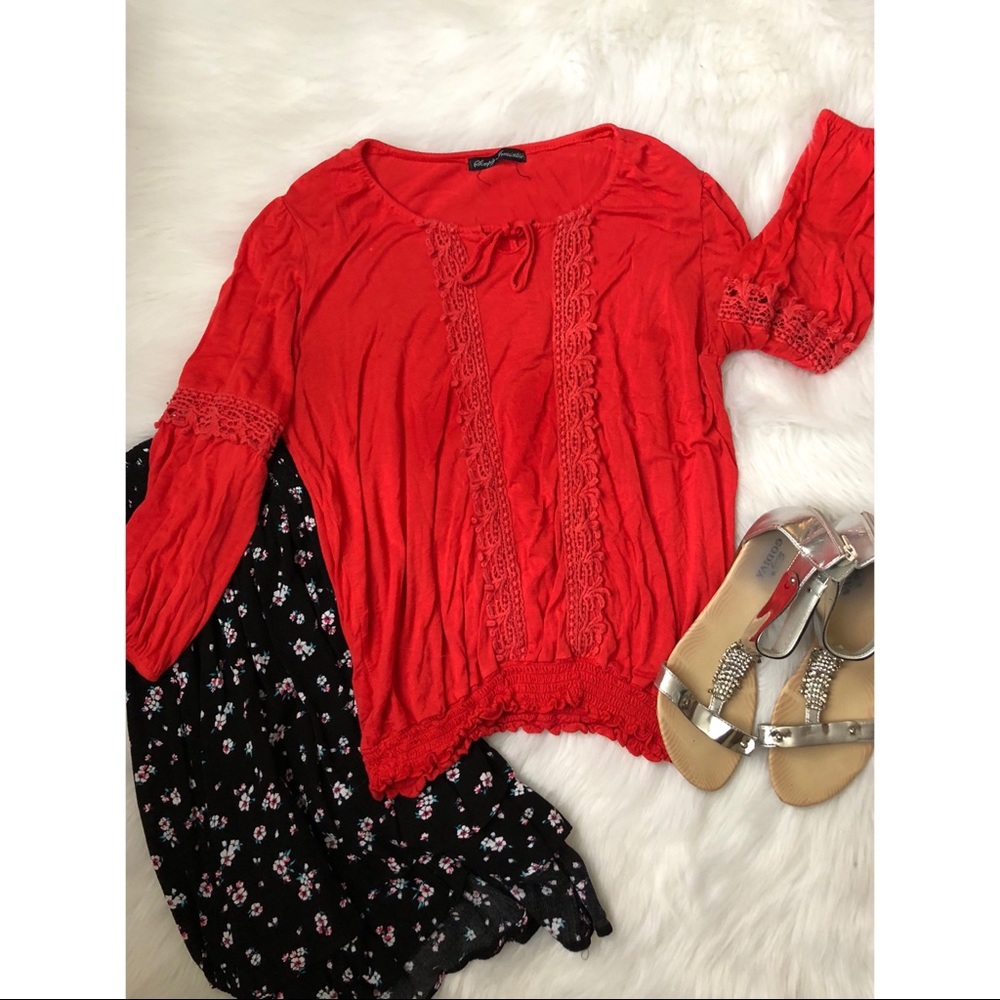 Red embroidered blouse